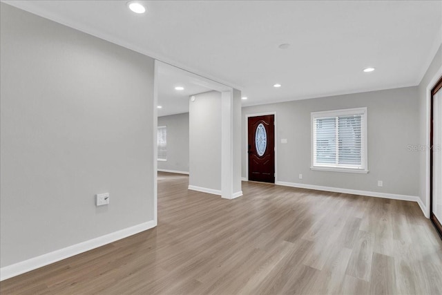 foyer with light hardwood / wood-style flooring