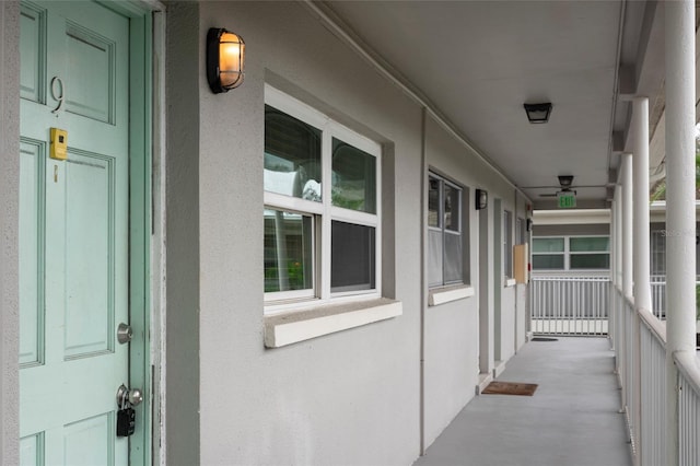 exterior space featuring ceiling fan