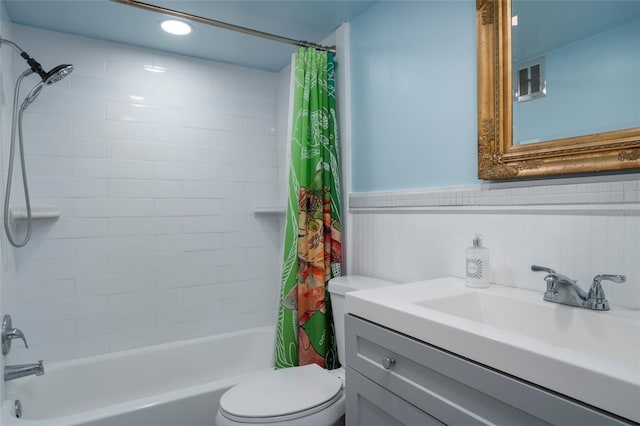 full bathroom with toilet, shower / bath combo, and vanity