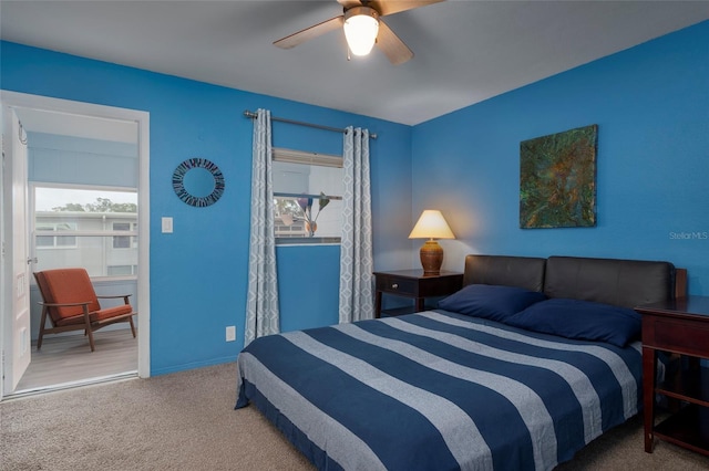 carpeted bedroom featuring ceiling fan