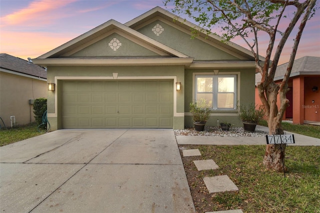 view of front of property featuring a garage