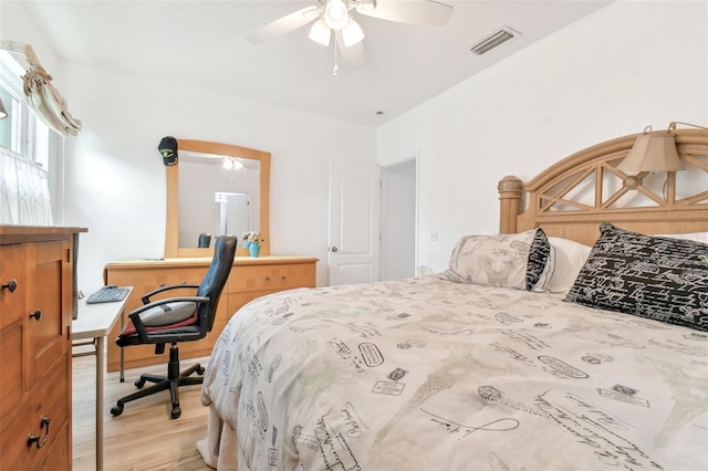 bedroom featuring light wood-type flooring and ceiling fan