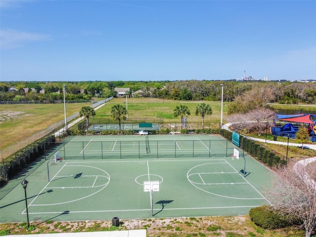 view of basketball court with tennis court