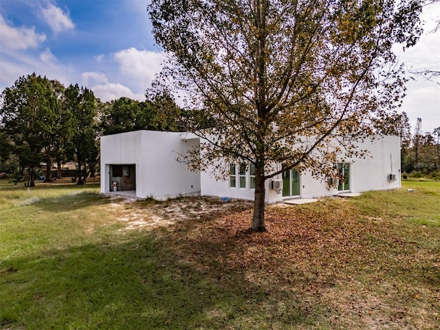 exterior space with a lawn