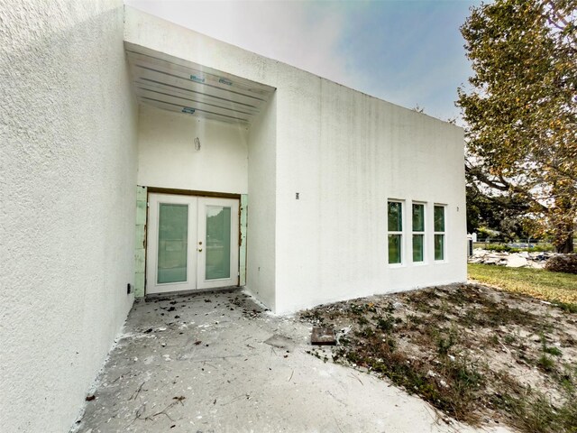 property entrance with french doors