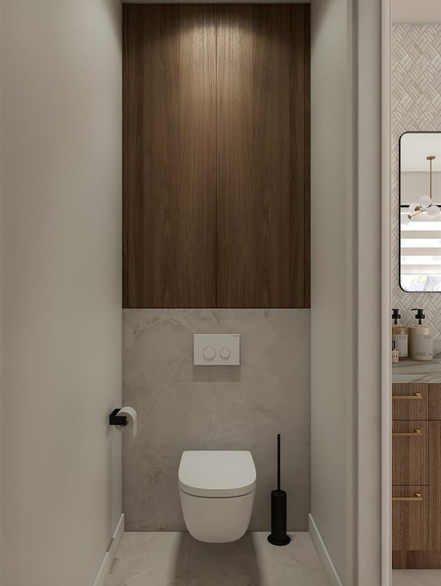 bathroom featuring backsplash, vanity, and toilet