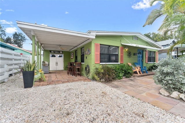 view of front of property featuring a patio