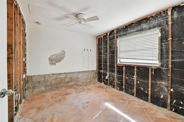 interior space featuring ceiling fan