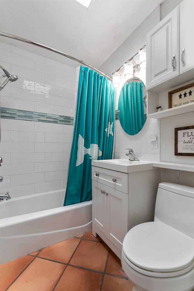 full bathroom featuring tasteful backsplash, vanity, tile patterned flooring, toilet, and shower / bath combo with shower curtain