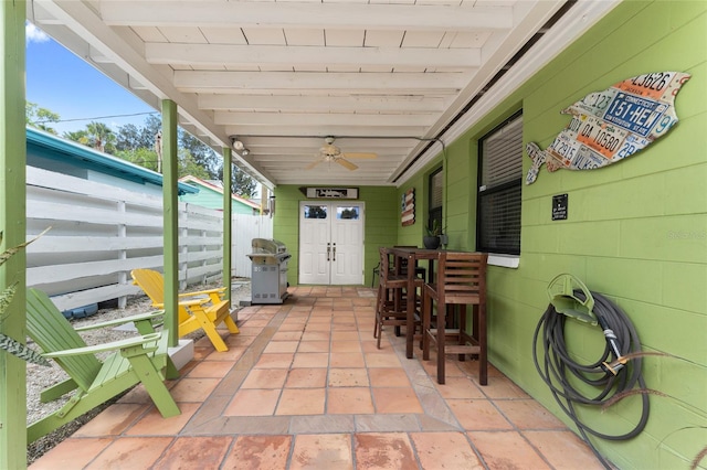 view of patio / terrace with a grill and ceiling fan