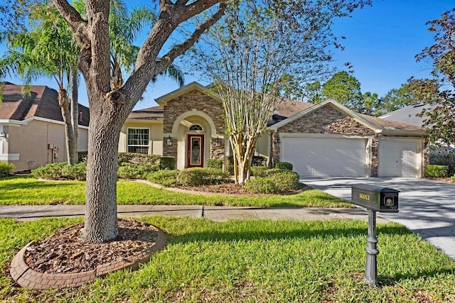 ranch-style home featuring a garage and a front yard