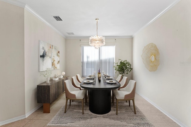 tiled dining area featuring a chandelier and ornamental molding