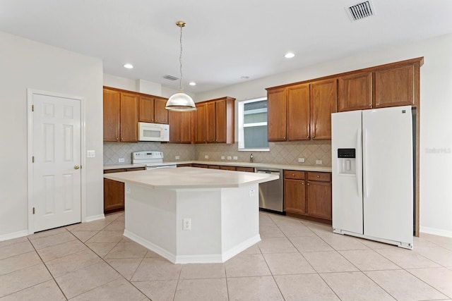 kitchen with a center island, hanging light fixtures, white appliances, decorative backsplash, and light tile patterned floors