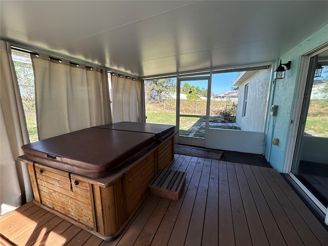 unfurnished sunroom with a healthy amount of sunlight