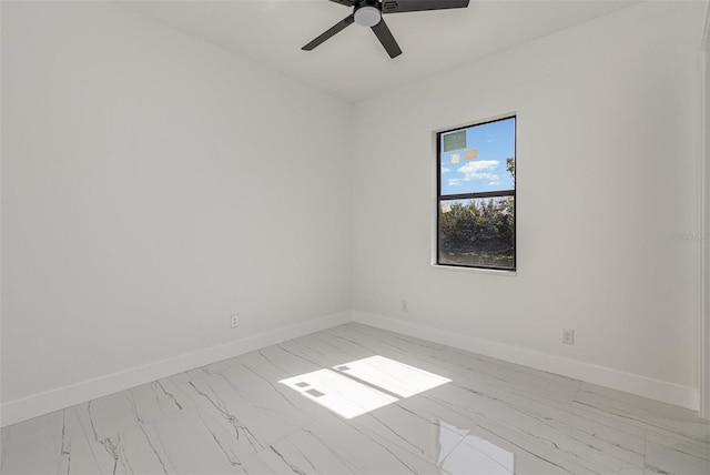 spare room featuring ceiling fan