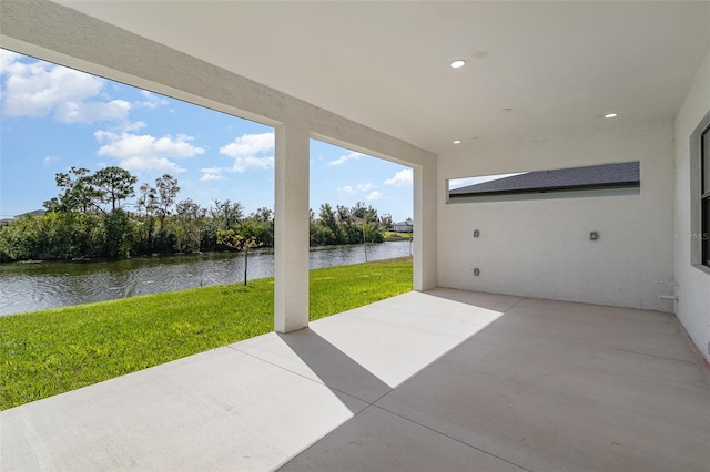 view of patio / terrace with a water view