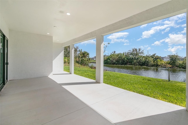 view of patio / terrace featuring a water view