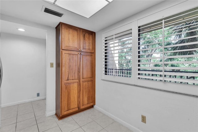 kitchen with light tile patterned floors