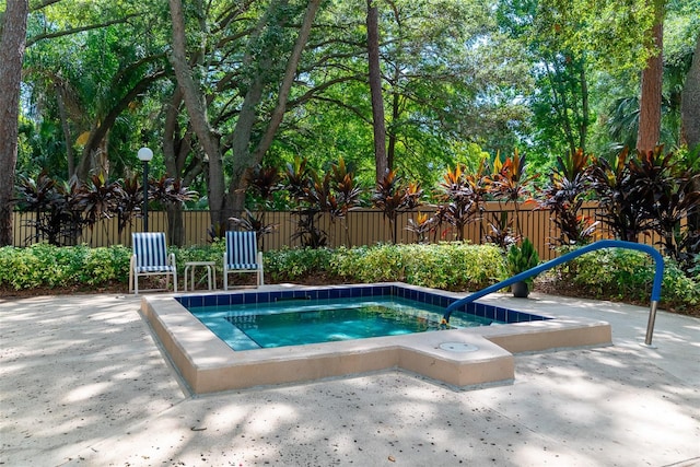 view of pool featuring a patio