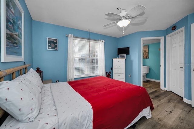 bedroom with wood-type flooring, ensuite bathroom, and ceiling fan