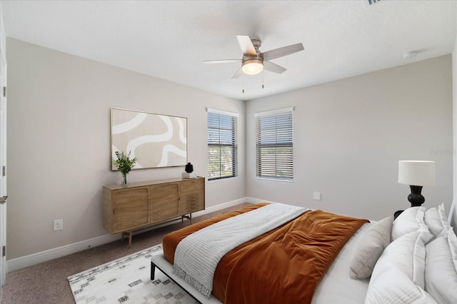 bedroom featuring ceiling fan and carpet floors