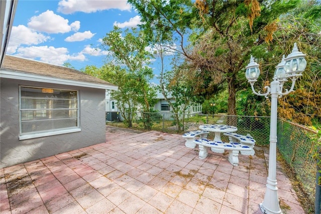 view of patio with central AC