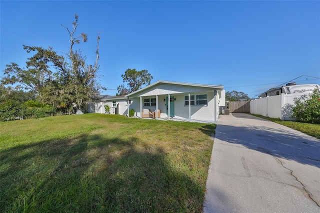 3207 Acacia St, Lutz, FL 33558 - ranch-style house with concrete driveway and covered porch