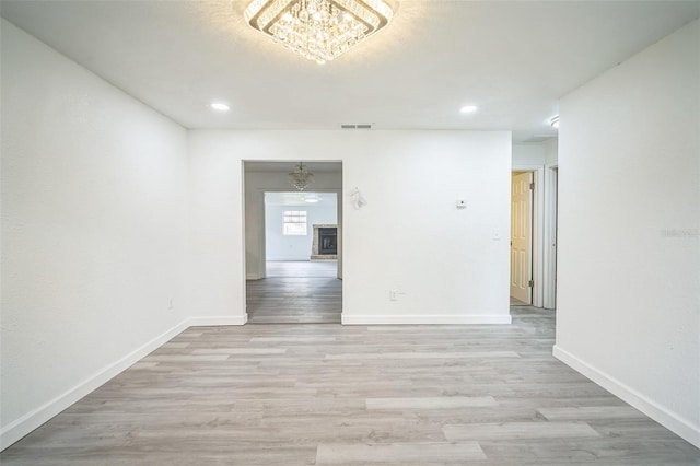 empty room with light wood-type flooring