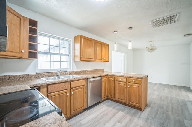 kitchen with light hardwood / wood-style floors, kitchen peninsula, hanging light fixtures, range, and stainless steel dishwasher