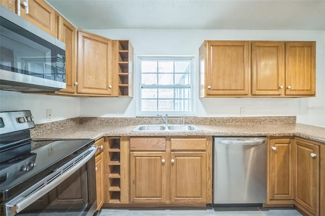 kitchen featuring appliances with stainless steel finishes and sink