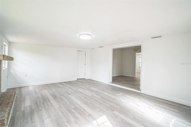 unfurnished room featuring light wood-type flooring