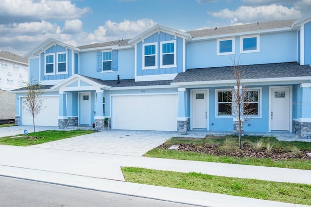 view of front of property with a garage