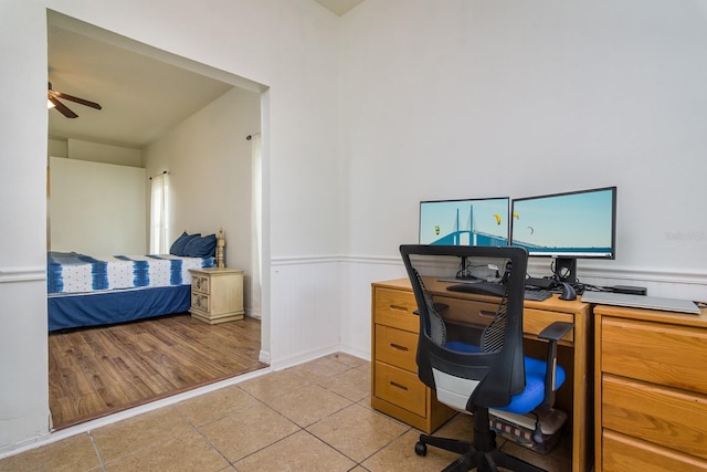 office area with light wood-type flooring and ceiling fan