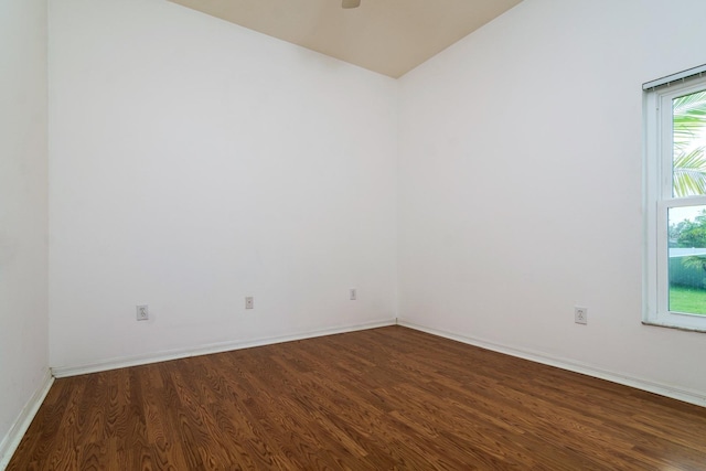 spare room with hardwood / wood-style flooring