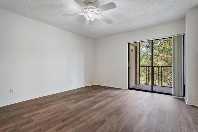 spare room with wood-type flooring, ceiling fan, and a textured ceiling