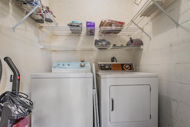 laundry room with separate washer and dryer