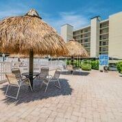 view of property's community with a patio