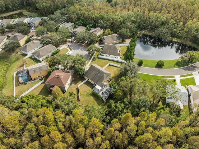 bird's eye view with a water view