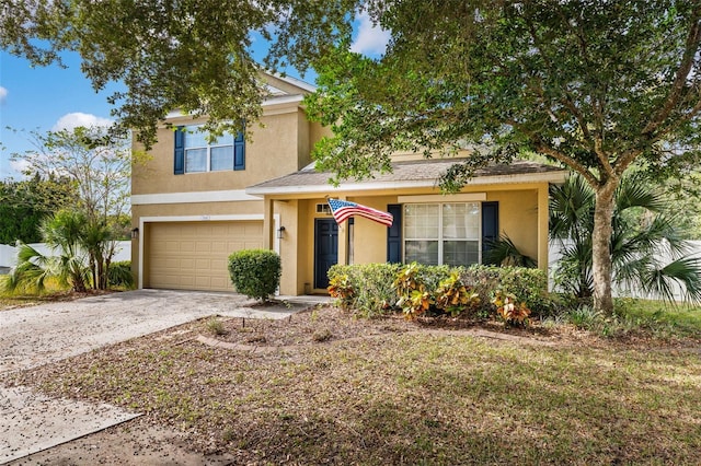 view of front of property with a garage