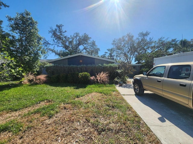 view of home's exterior featuring a lawn