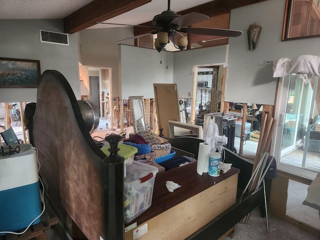 home office featuring vaulted ceiling with beams, a healthy amount of sunlight, and ceiling fan