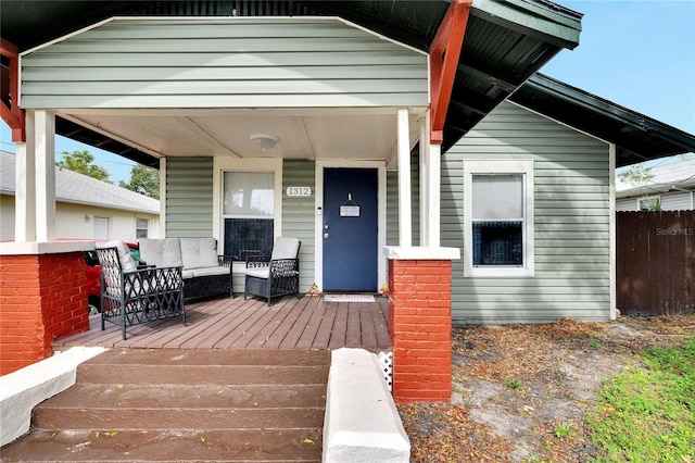 view of front of home featuring outdoor lounge area and a porch