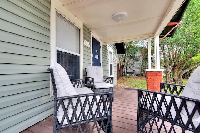 deck featuring covered porch