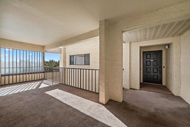 doorway to property with a balcony