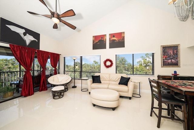 living room featuring tile patterned flooring, high vaulted ceiling, and ceiling fan