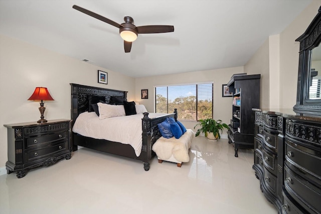 bedroom with tile patterned floors and ceiling fan