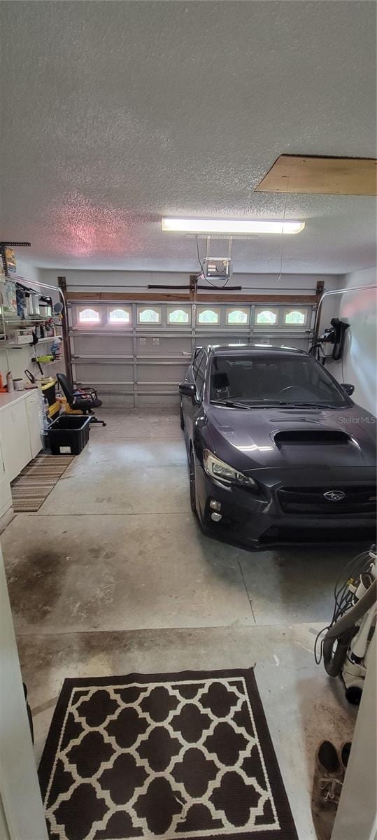 garage featuring washer / dryer