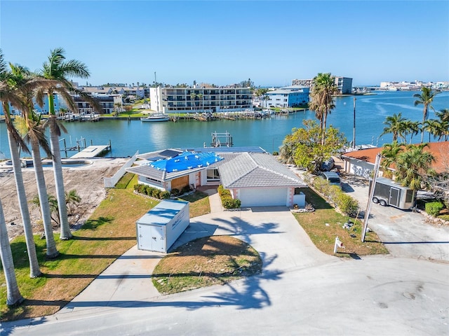 drone / aerial view with a water view