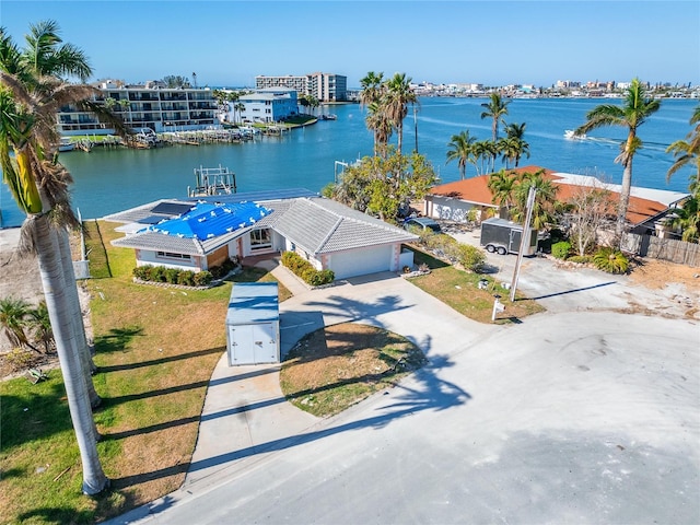 drone / aerial view with a water view