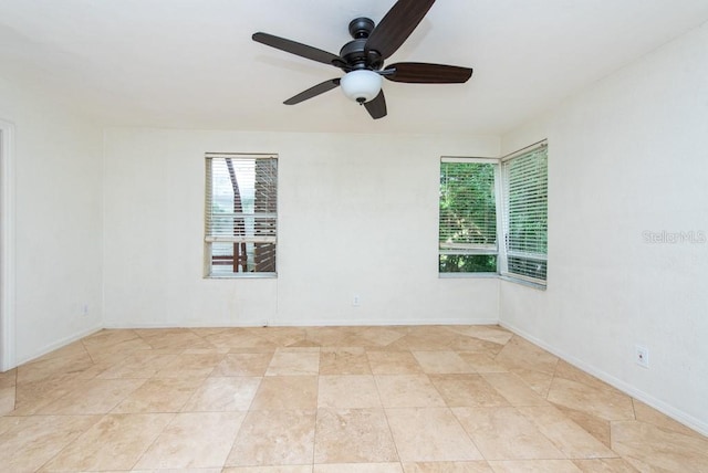 spare room featuring ceiling fan